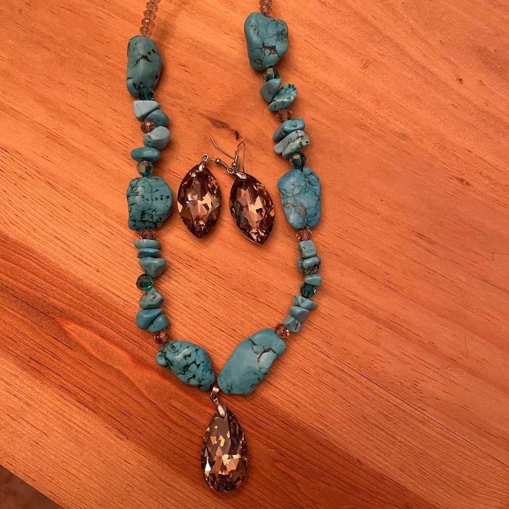 Barely used turquoise necklace w huge center and earrings in topaz color